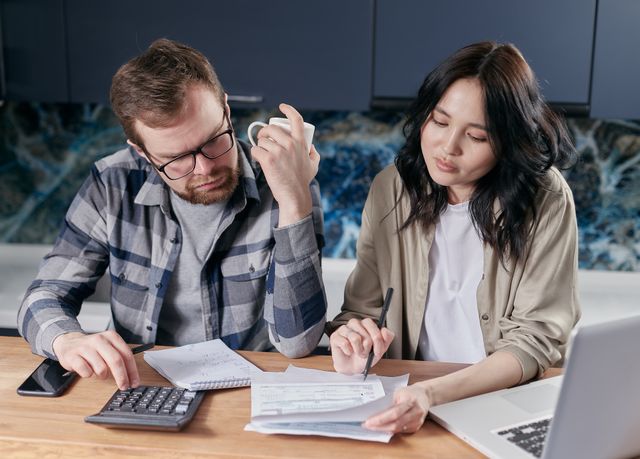 people calculating finances